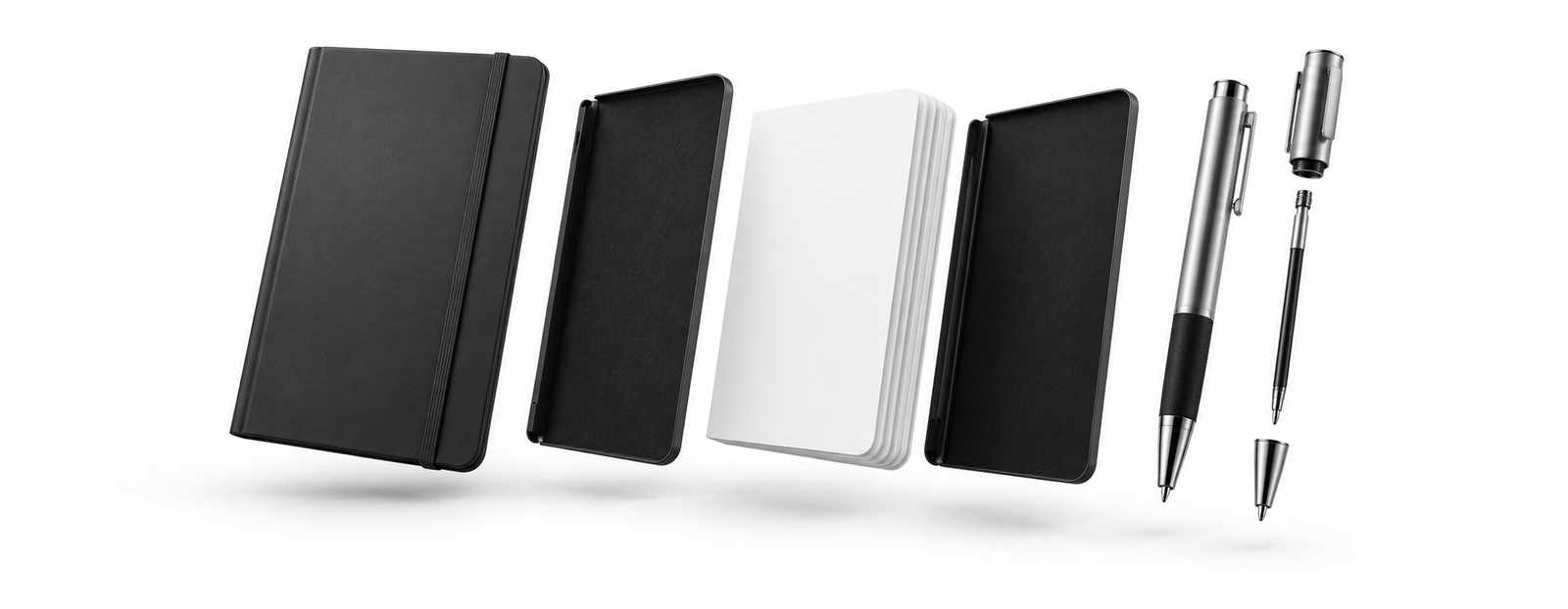 A black notebook with white pages and a silver pen on a white background